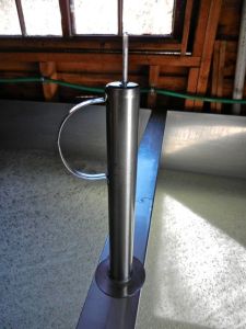 Testing sap sweetness with the sap hydrometer. It reads about 2.4 percent sugar. 